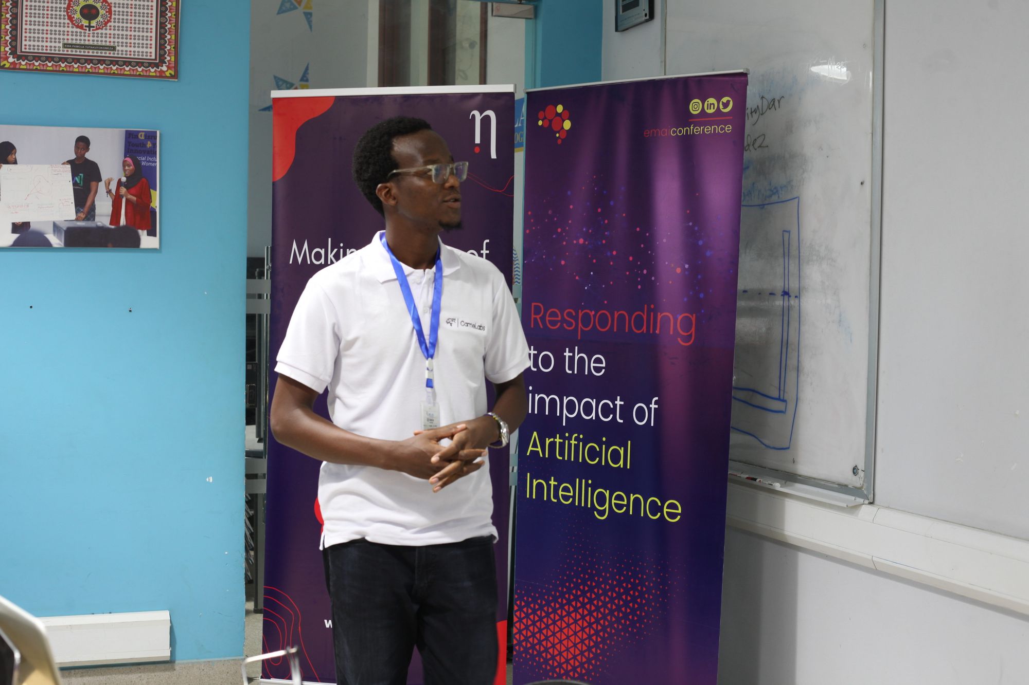 Zephania Reuben speaking at EnhanceMind AI Conference 2022